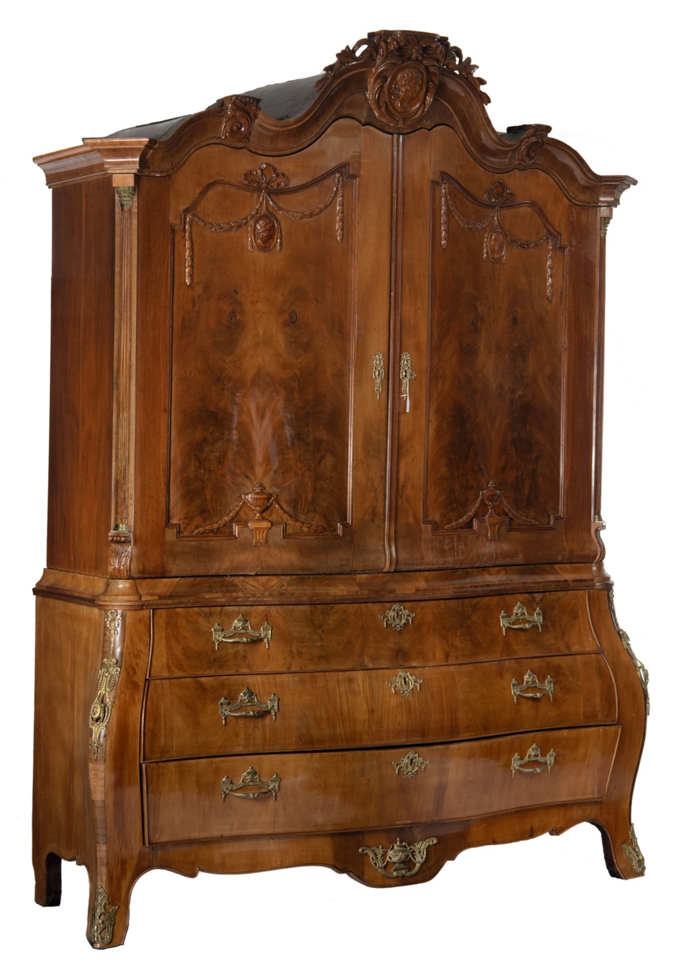 A large and imposing mahogany veneered Dutch Neoclassical cabinet, decorated with gilt bronze mounts