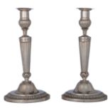 A rare pair of Neoclassical silver candlesticks, Ghent (17)91 hallmarked, makers' mark P.J. Tiberghi