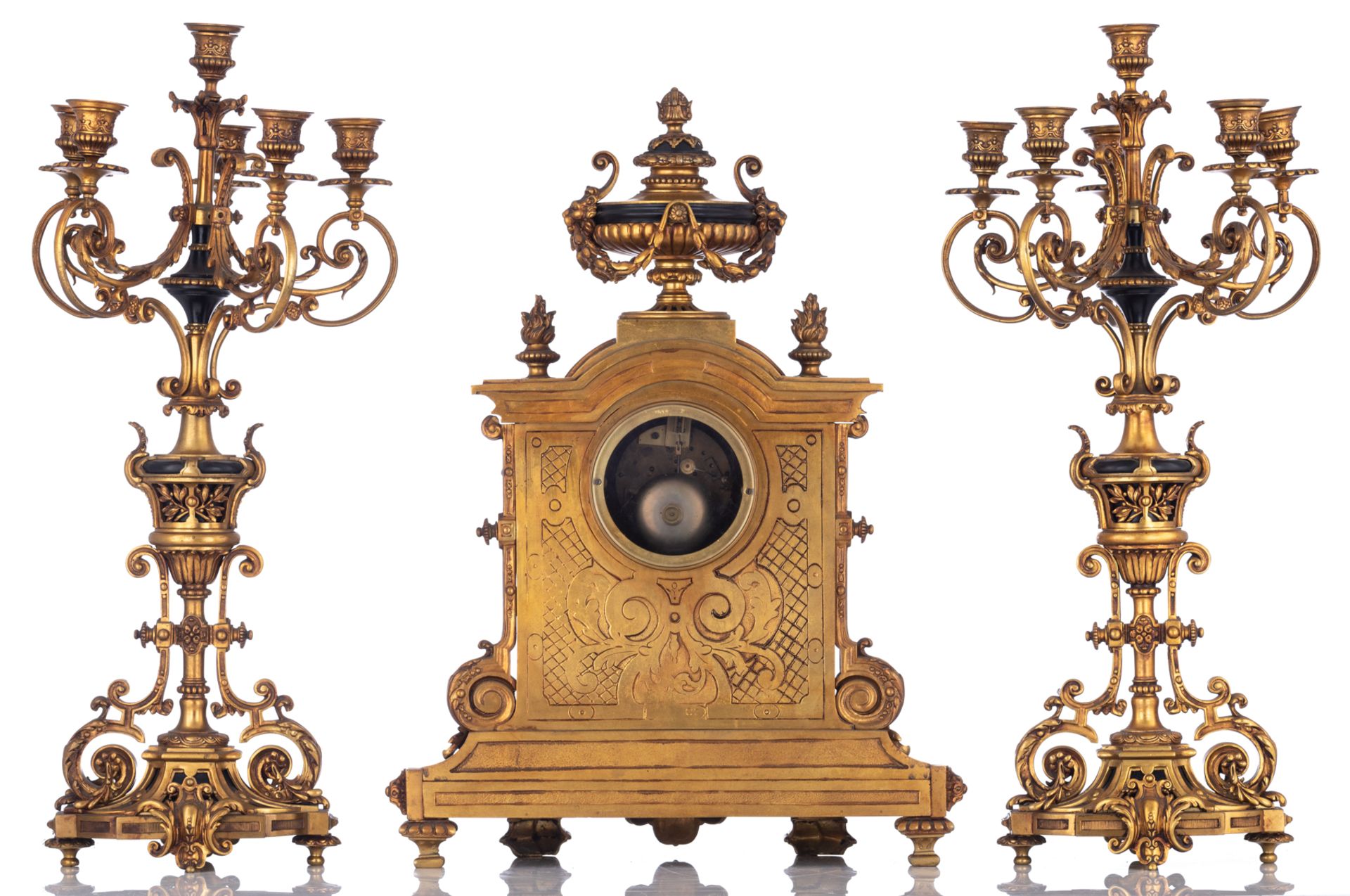 A gilt bronze Baroque inspired three-piece clock garniture, the clock decorated with a trophy on top - Image 3 of 9