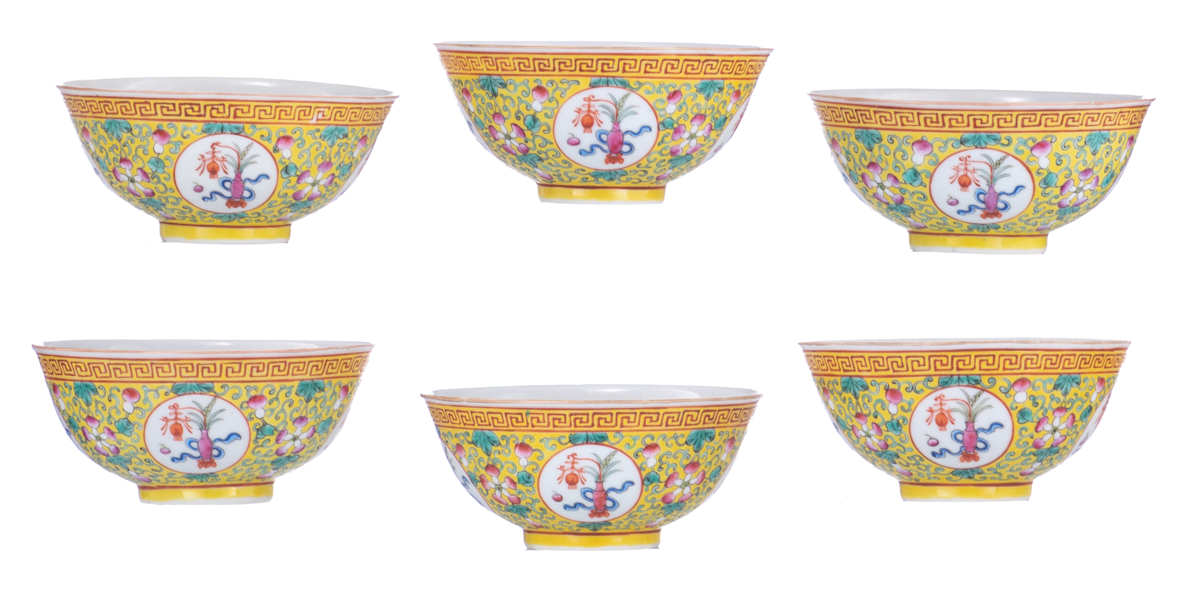 Six Chinese yellow ground famille rose floral decorated bowls, the panels with flower vases, the ins