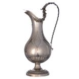 A French late 18thC particular elegant Neoclassical silver ewer with cover, the lid, a part of the b