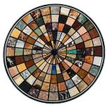 A round tabletop in Italian pietra dura, decorated with geometric motifs in various types of marble,