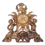 A fine gilt bronze Rococo Revival mantle clock, decorated with putti, the inside mechanism marked 'M