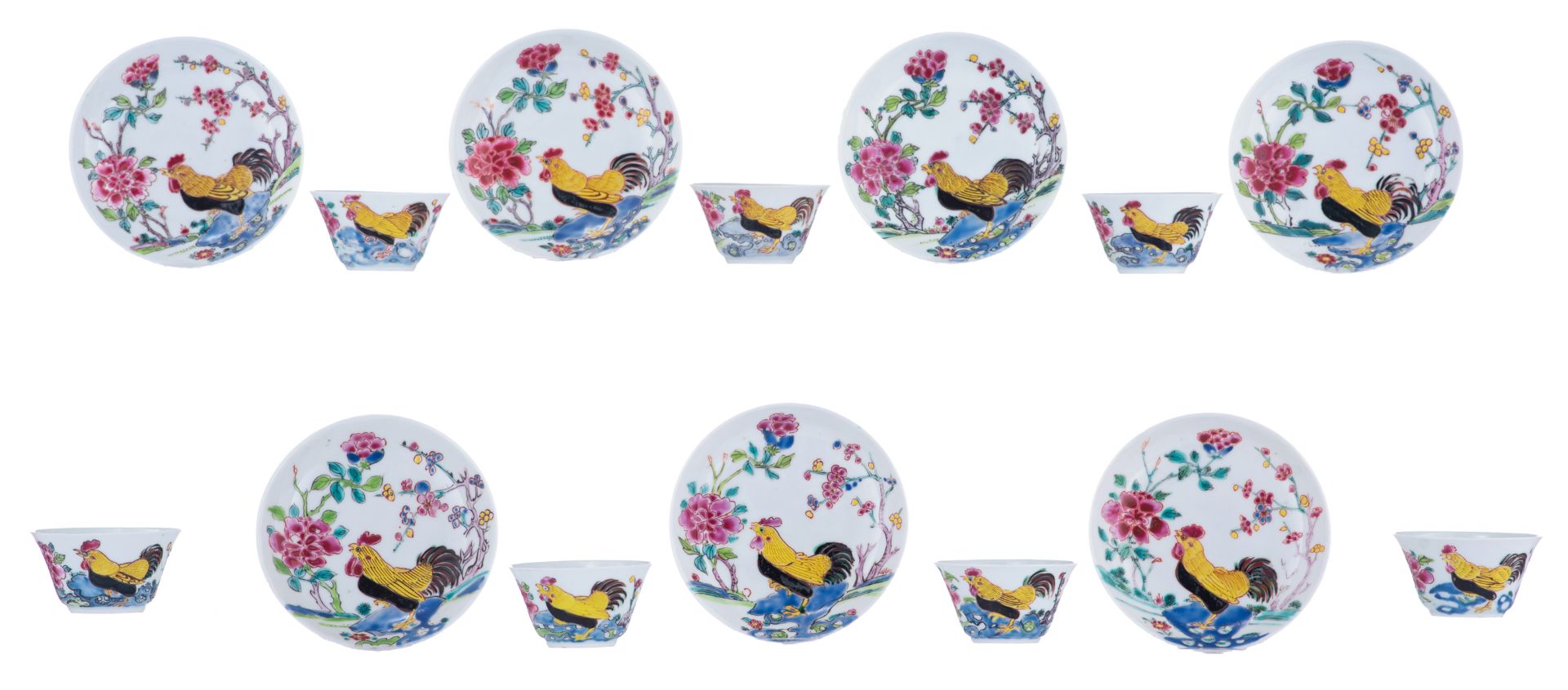 Seven famille rose cups and matching saucers, decorated with a cockerel amidst flower branches, Yong