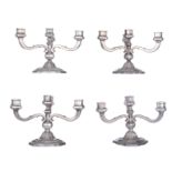 A series of four French Regence style silver four arms candelabras, 835/000, Belgian post-1942 marke