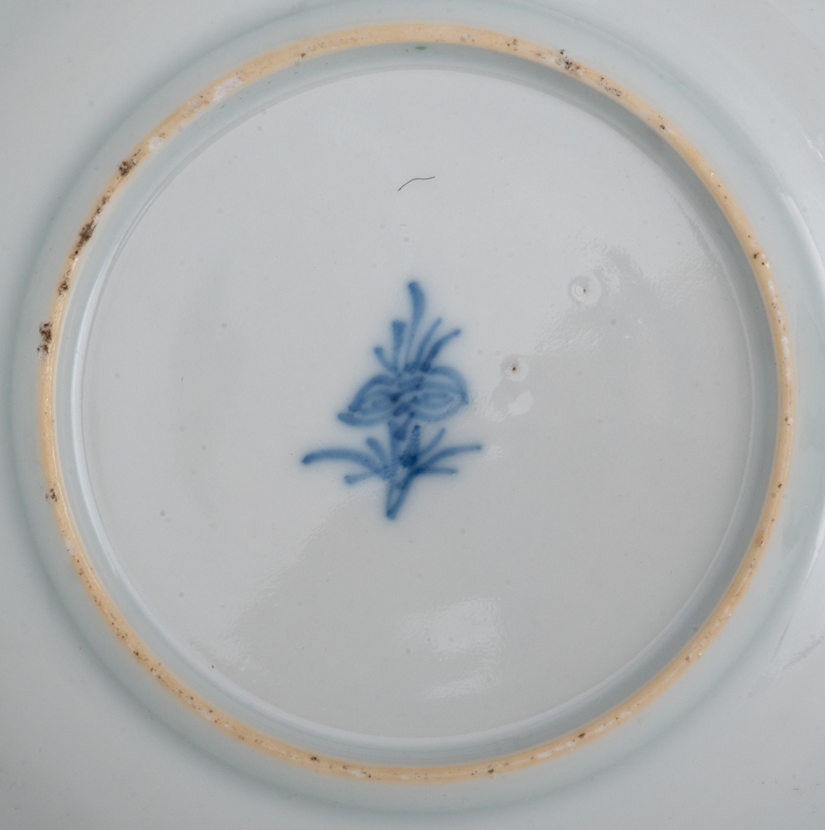 A Chinese famille verte cup and saucer, decorated with an erotic scene, Kangxi symbol mark and of th - Image 6 of 7