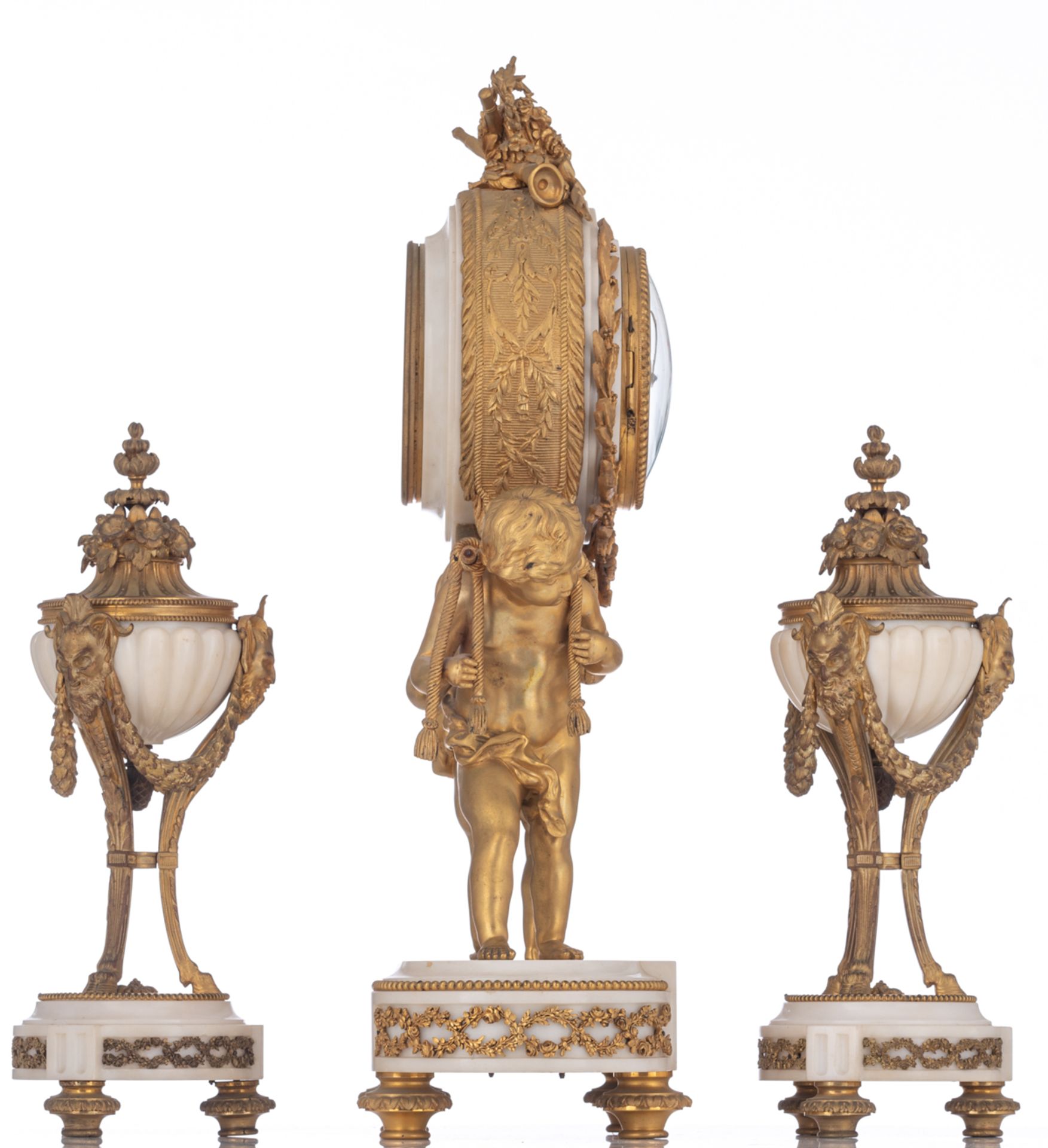 A Neoclassical Carrara marble and gilt bronze three-piece mantle clock garniture, decorated with two - Image 4 of 9