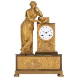 An ormolu bronze mantle clock with on top an allegory on wisdom, the dial marked 'Galle Rue Vivienne
