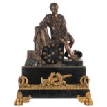 A Neoclassical noir Belge marble and gilt bronze mantle clock with on top a patinated bronze Roman w