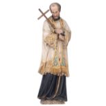 A polychrome painted oak Gothic Revival figure of Saint Francis Xavier, 19thC, H 70 cm