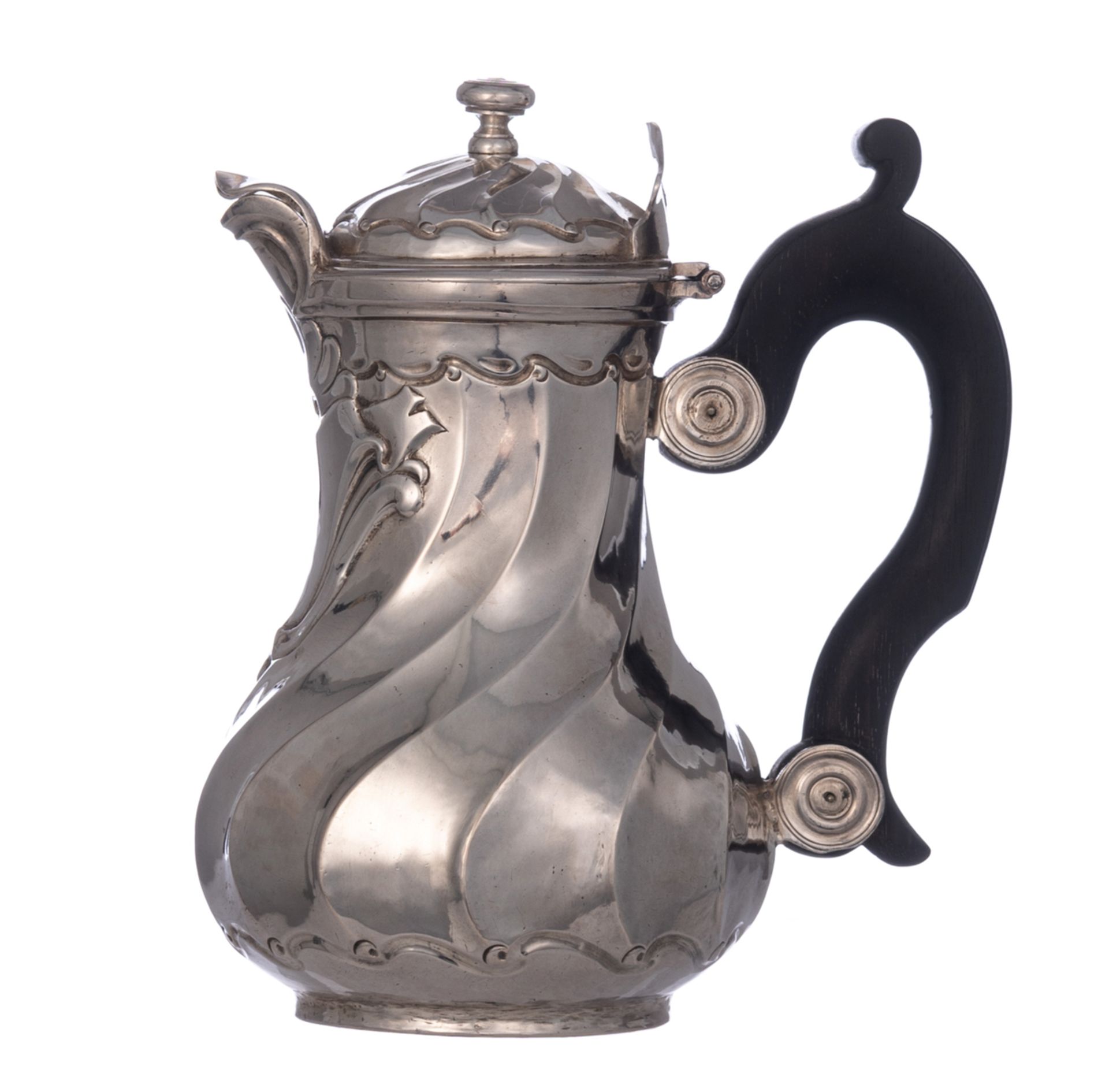 An 18thC French silver Rococo 'solitaire' coffee pot with an ebony handle, illegibly hallmarked, H 1
