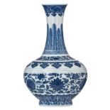 A Chinese blue and white bottle vase, decorated with scrolling lotus and upright leaves, with a Xian