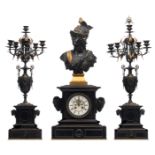 A large Neoclassical noir Belge three-piece mantle clock garniture, the clock with on top a gilt and