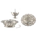 An English relief and openwork decorated silver bread basket with swing handle, London 1769 hallmark