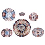 Four Japanese Imari floral decorated lobed dishes; added a ditto charger and a box and cover, 19thC,