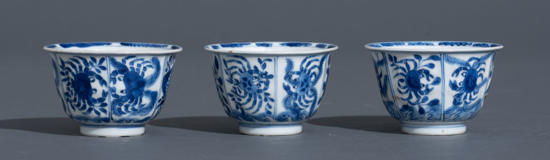 Three Chinese blue and white Kangxi period teacups and saucers, decorated with an underwater jungle; - Bild 11 aus 24