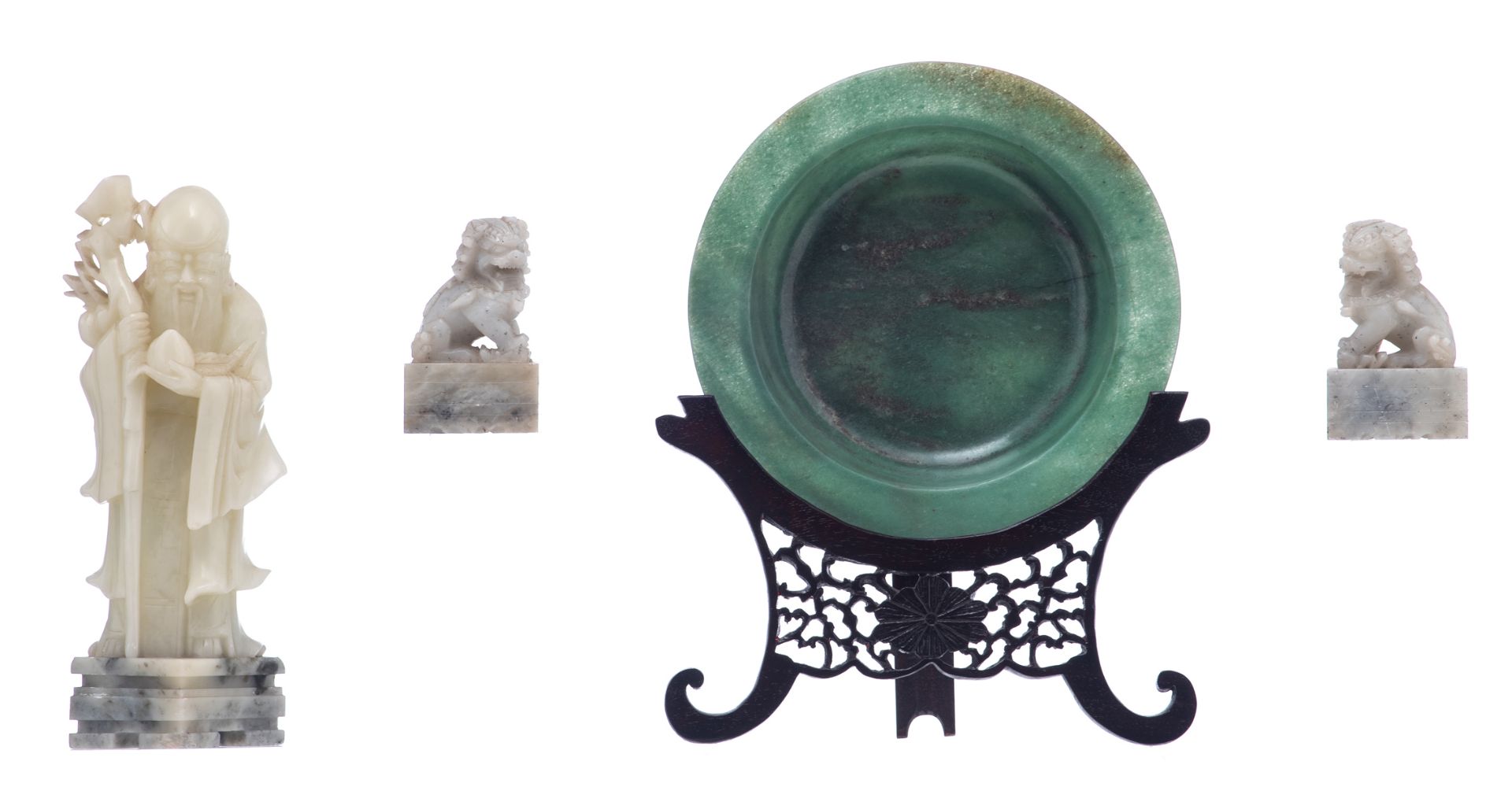 A Chinese spinach jade dish on a sculpted wooden stand; added a ditto pale jade sculpture, depicting