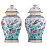 A pair of Samson porcelain vases and cover, painted with a phoenix and butterflies in a garden setti
