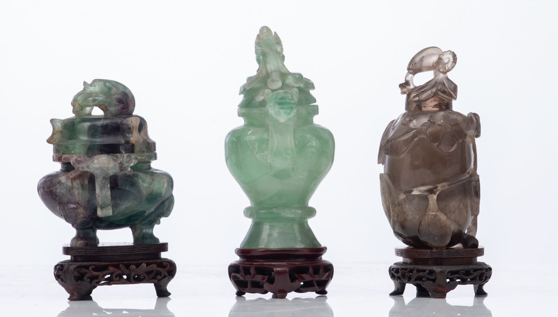 Three Chinese carved green jade vases and covers, Qing dynasty; added a Chinese carved smoky quartz - Image 10 of 14