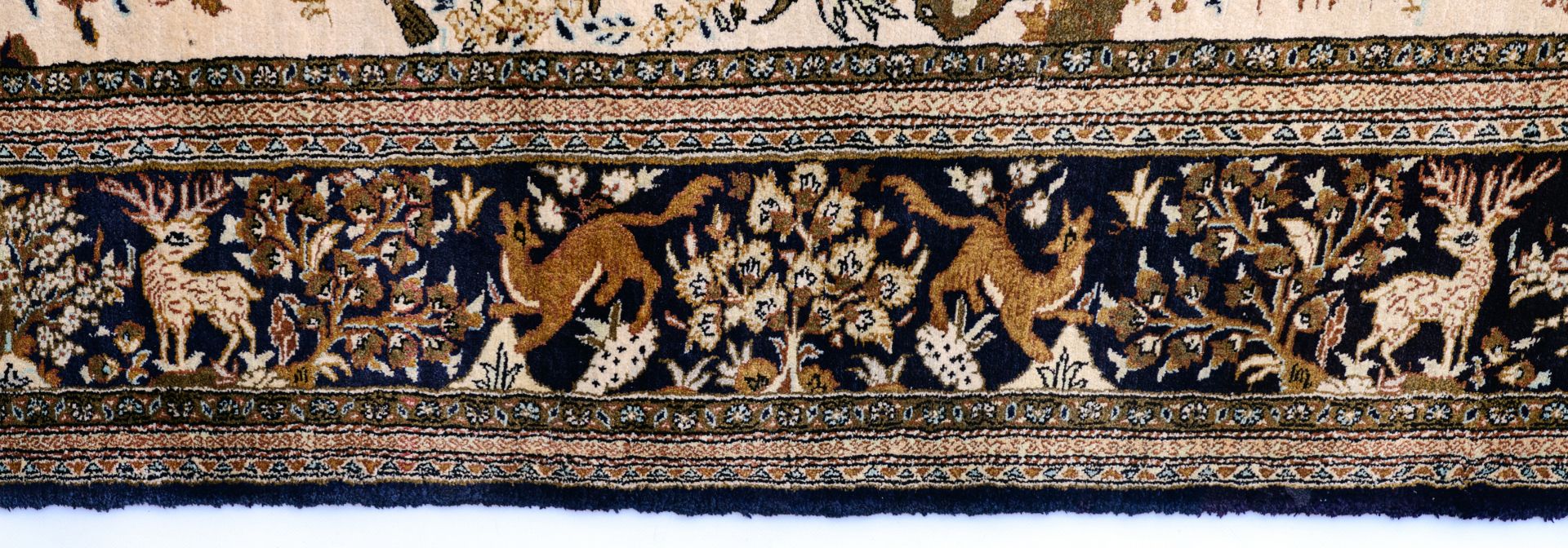 An Oriental silk rug depicting animals scenes in paradise, 145 x 227 cm - Image 6 of 6