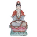 A Chinese polychrome decorated Guanyin, seated on a lotus base, late 19thC, H 45,5 cm