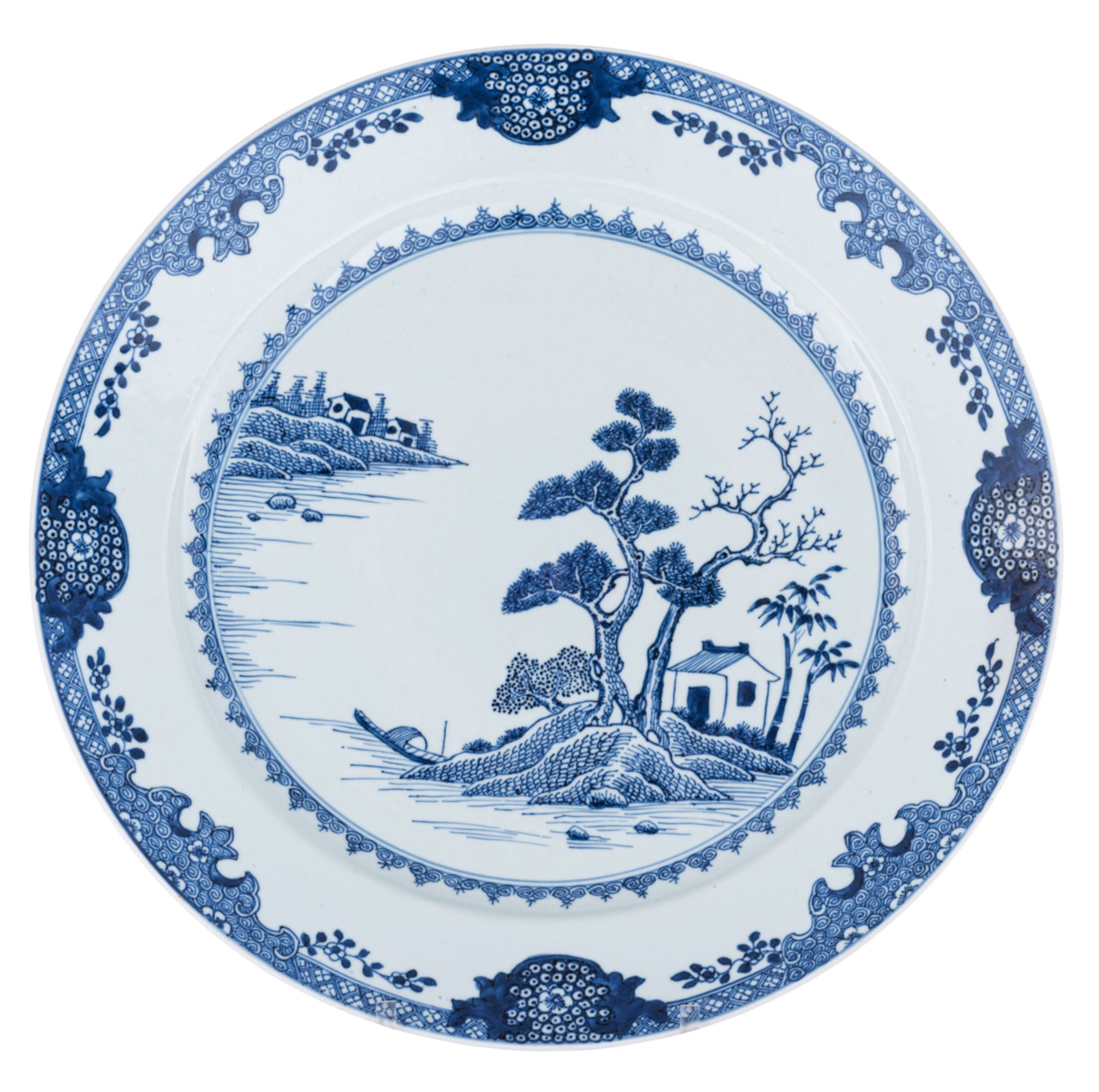A Chinese blue and white export porcelain plate, decorated with a pavilion in a river landscape, 18t