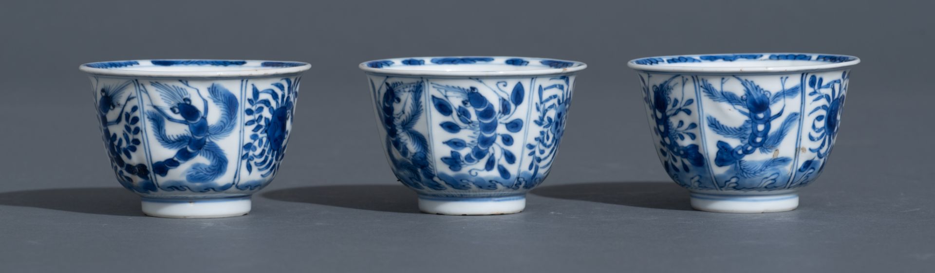 Three Chinese blue and white Kangxi period teacups and saucers, decorated with an underwater jungle; - Bild 10 aus 24