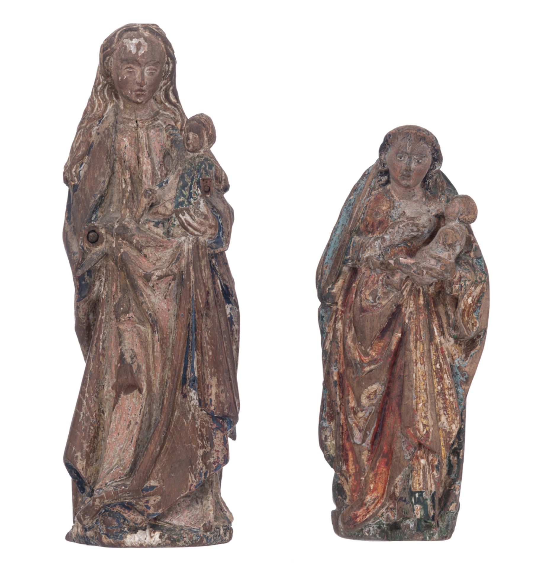 A 16th/17thC oak sculpture with traces of polychrome paint representing the Nursing Madonna, Souther