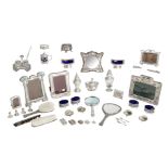 A varied lot of 19th and 20thC, mostly English silver gadgets, photo frames, and tablewares