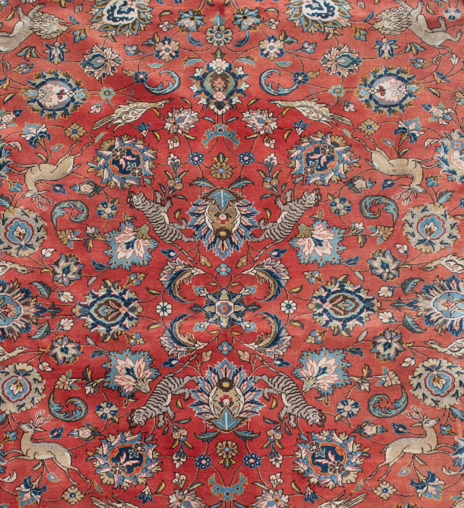 An Oriental woollen rug, decorated with hunting lions, deer and birds surrounded by flowers, 234 x 3 - Bild 4 aus 5