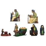 A collection of typical Flemish earthenware figure groups in the Arts & Crafts manner, consisting of