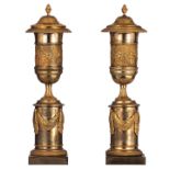 A fine pair of French Restauration ormolu bronze potpourris, decorated with a basso-relievo frieze d