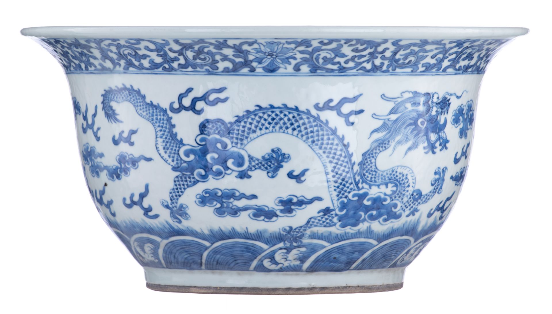 A Chinese blue and white jardinière, decorated with a pair of dragons chasing a flaming pearl amidst - Image 5 of 7