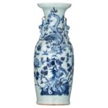 A Chinese celadon vase, blue and white decorated with a dragon and a phoenix, paired with Fu lions,