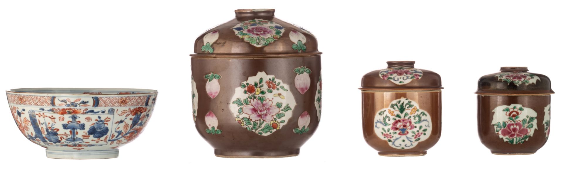 Three Chinese café au lait and famille rose ginger jars and covers, decorated with fruits and flower