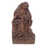 A very fine carved late 15th/early 16thC oak sculpture depicting the Holy Mother and Child, Southern