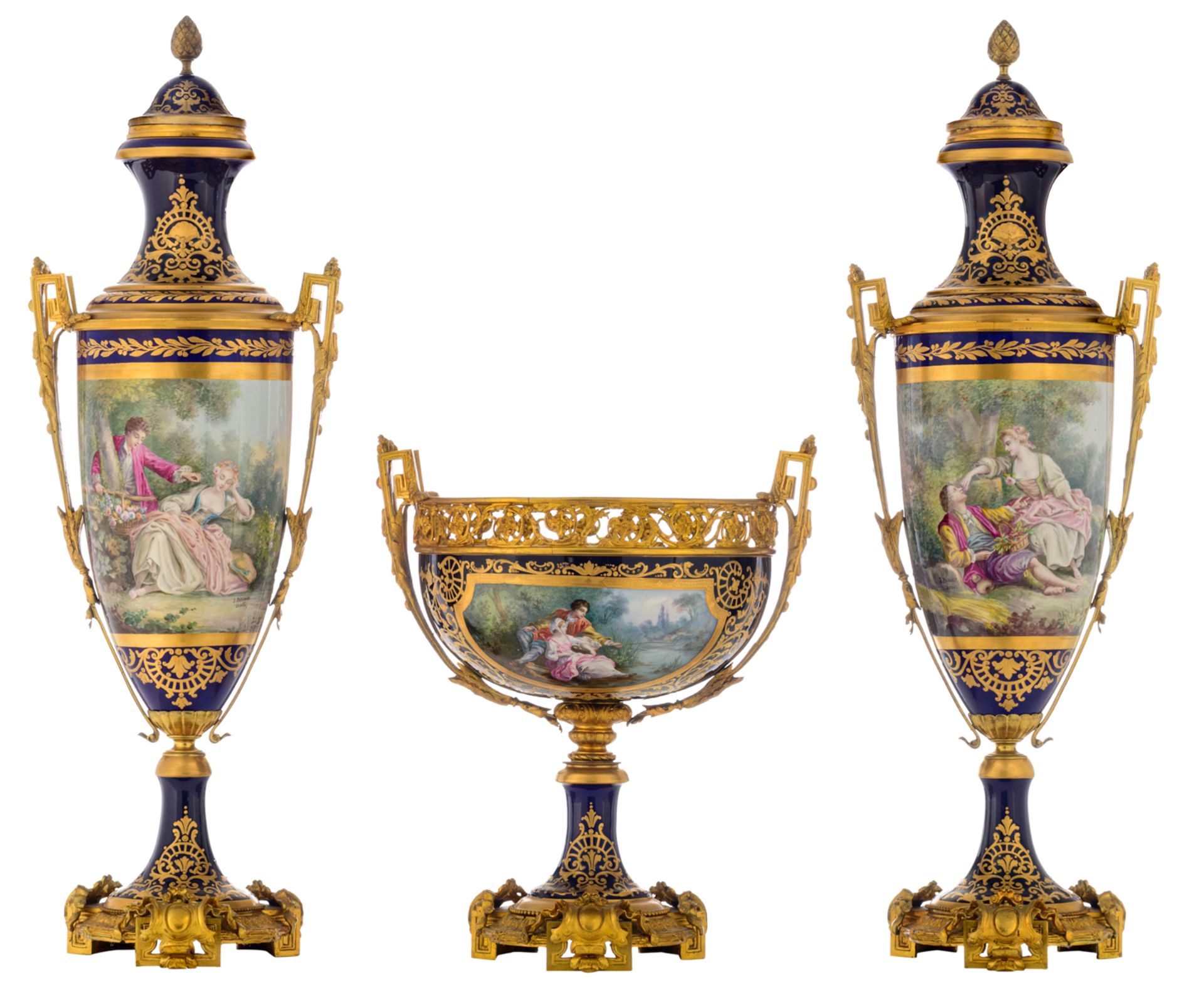 An imposing and exceptional Sèvres three-piece garniture set, consisting of two large bleu royale gr