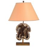 A brass design lamp with the cross-section of an agatized fossil coral, H 23 cm (the stone) 64,5 cm