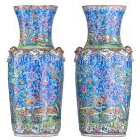 A pair of Chinese famille rose vases, decorated with phoenix and birds in flower branches, paired wi