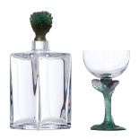 A Daum square glass decanter with green glass paste cactus stopper, signed 'Daum France', H 23,5 cm;