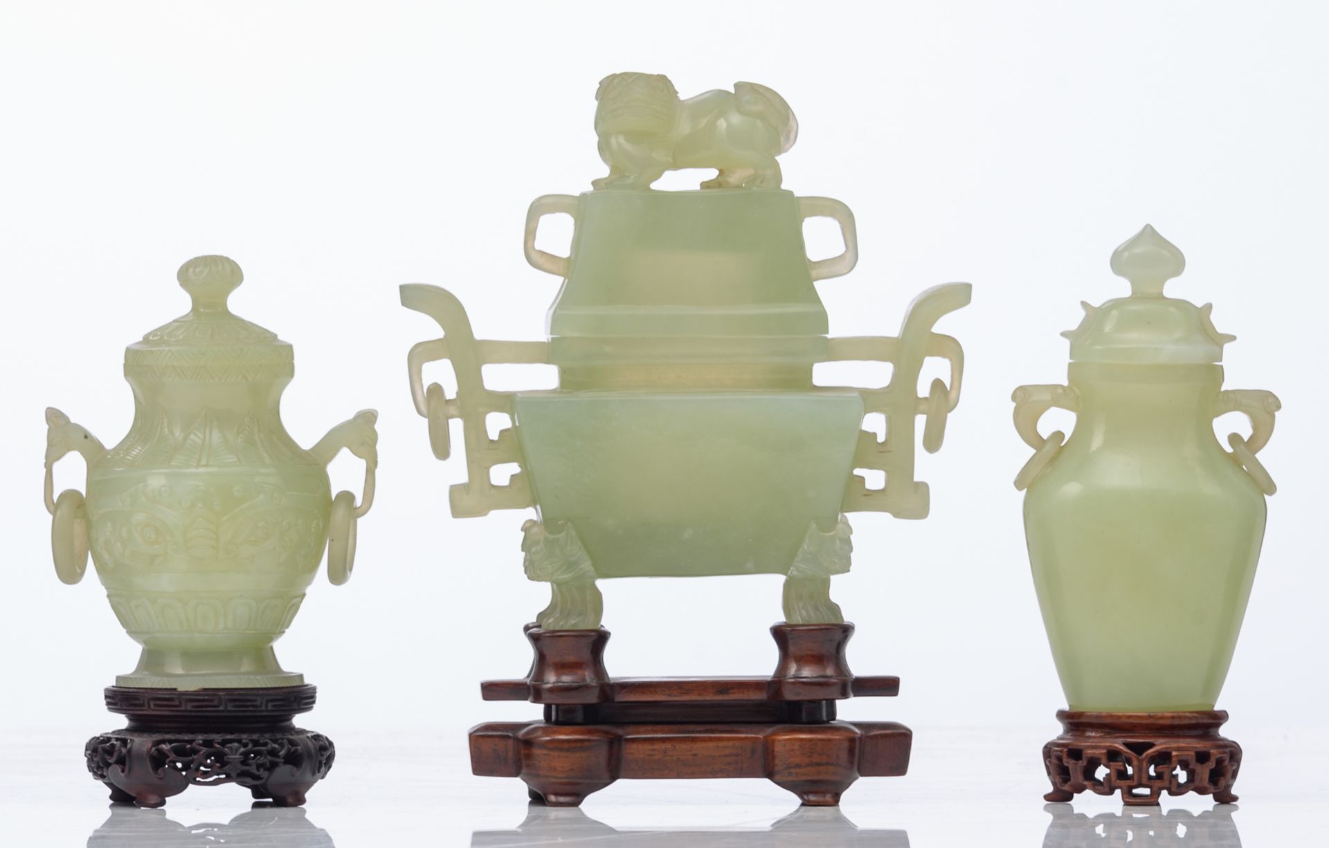 Three Chinese carved green jade vases and covers, Qing dynasty; added a Chinese carved smoky quartz - Image 3 of 14