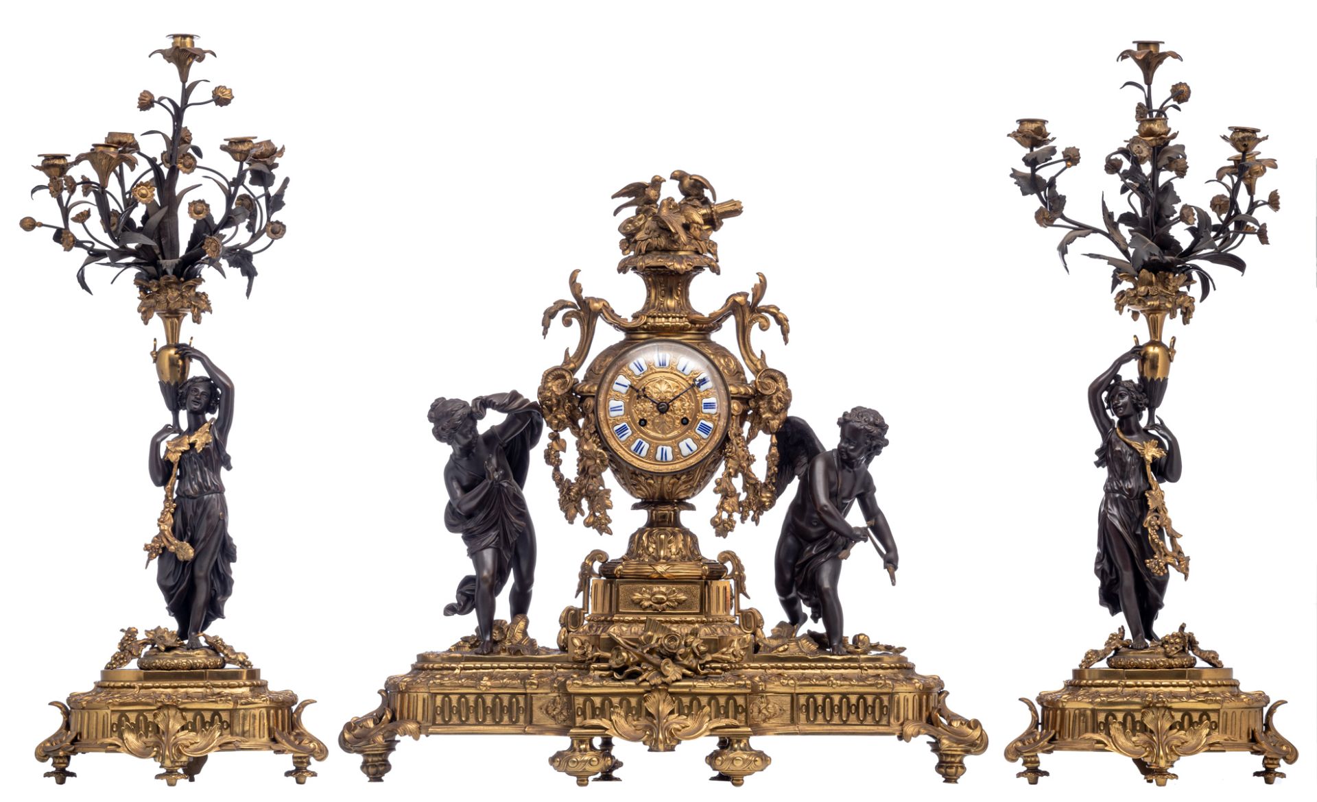 An imposing gilt and patinated bronze Neoclassical three-piece mantle clock garniture, the clock dec