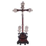 An ebony, ebonized wood, and tortoiseshell veneered crucifix with silver corpus Christi and-side mou