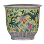 A Chinese yellow ground famille rose floral decorated jardinière, the body with a dragon and a phoen