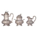 A three-piece second half of the 19thC silver coffee-set consisting of a coffee pot, a sugar bowl an