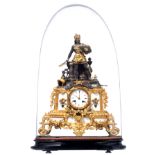 A 19thC French gilt and patinated bronze mantel clock with Carrara marble plaques, and on top a well