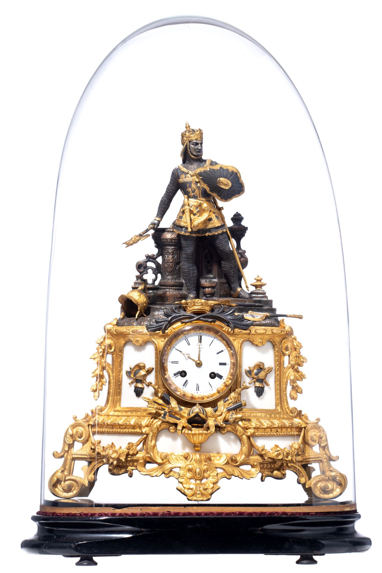 A 19thC French gilt and patinated bronze mantel clock with Carrara marble plaques, and on top a well