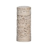 A Chinese Canton ivory cylindrical case and cover, carved in alto relievo with figures, attendants,