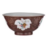 A Chinese brown-ground and famille rose export porcelain bowl, the panels decorated with antiquities