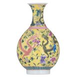 A Chinese yellow ground bottle vase, decorated with flowers and dragons, with a Yongzheng mark, H 37